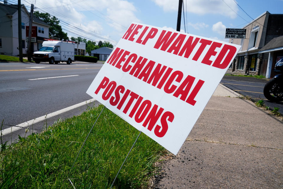 FILE - A help wanted sign is posted on the side of a road in Warminster, Pa., Thursday, June 2, 2022. The Labor Department reports Thursday, Nov. 17, on the number of people who applied for unemployment benefits last week. (AP Photo/Matt Rourke, File)