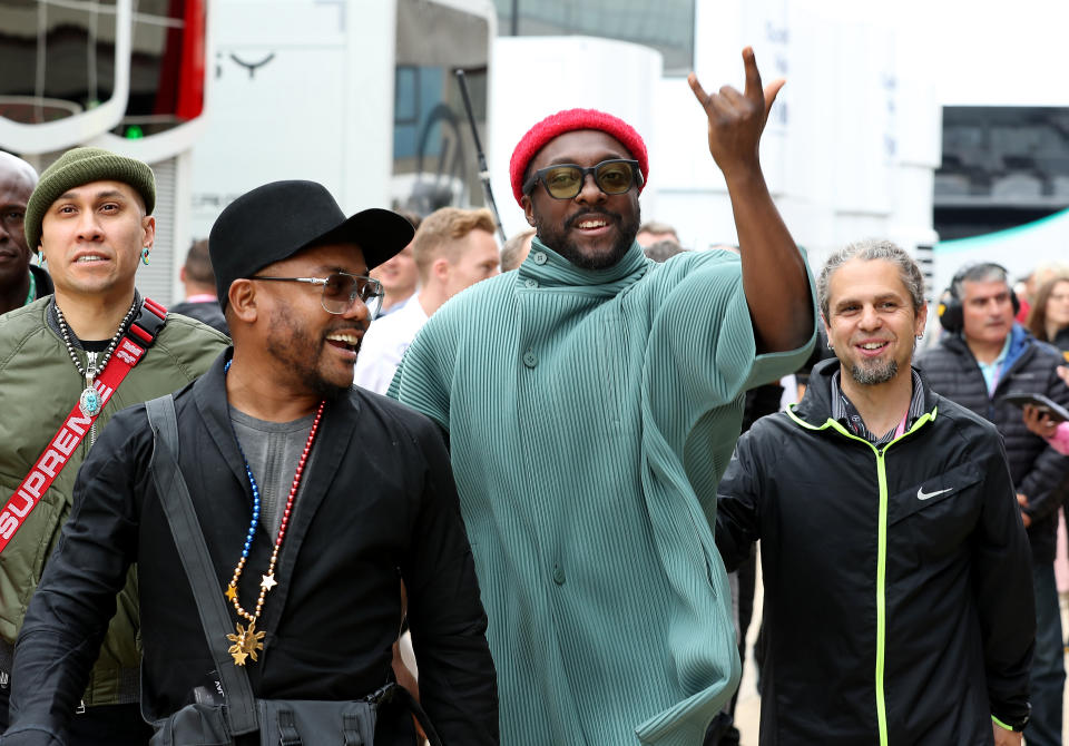 will.i.am, apl.de.ap, and Taboo from the The Black Eyed Peas during qualifying for the British Grand Prix at Silverstone, Towcester.