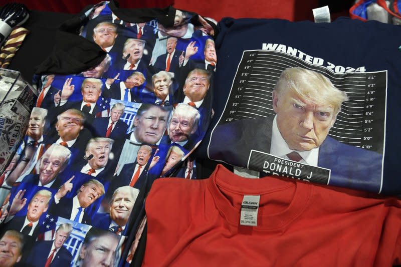 Clothing featuring former President Donald Trump, including a police mug shot t-shirt, is for sale at the Conservative Political Action Conference on Thursday in National Harbor, Md. Photo by Mike Theiler/UPI