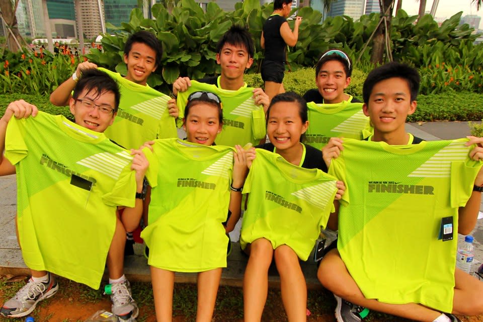 Runners delighted after receiving their finisher's t-shirts. (Photo courtesy of Nike Singapore)