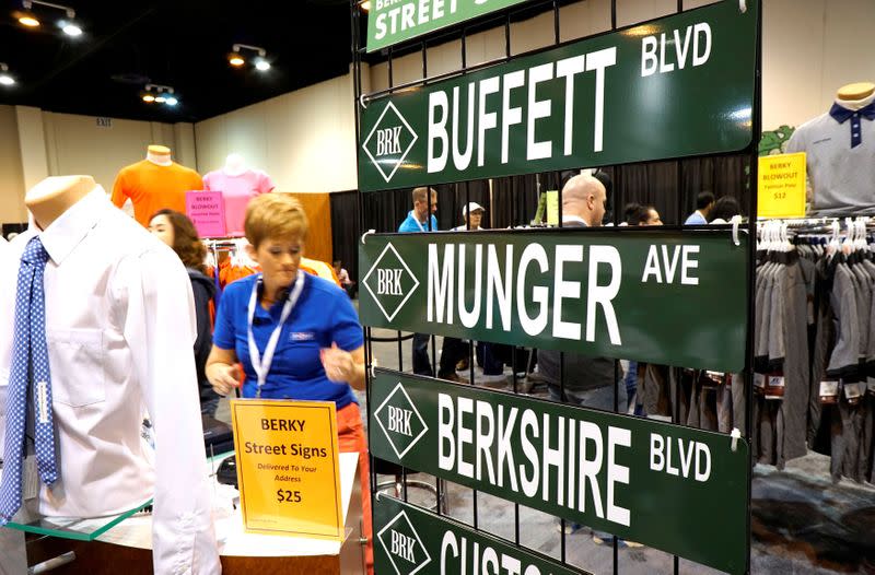 FILE PHOTO: Berkshire Hathaway signs are displayed for sale at the shareholder shopping day in Omaha