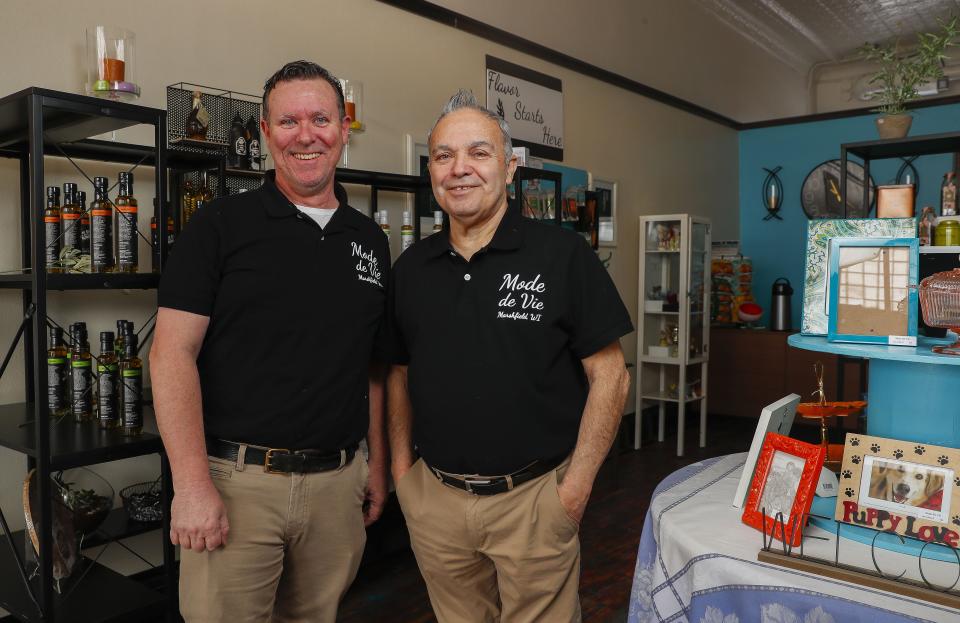 James Hederer and Mario Ortega pose for a portrait on March 15 at Mode de Vie in downtown Marshfield. The shop, which will sell home goods, spices and olive oils, will open on March 22 at 111 W. Second St.