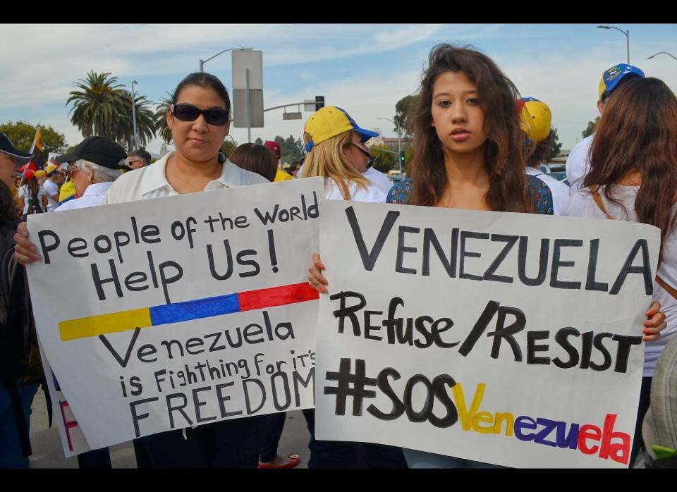 Marta and Andrea Aleman, mother and daughter, demonstrate along Veteran Avenue in Los Angeles, California. Maria relocated to to United States 16 years ago.