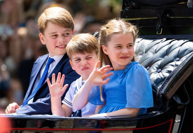 Prince George, Prince Louis, Princess Charlotte wave from their carriage during Trooping the Colour on June 2, 2022 - Credit: MEGA.