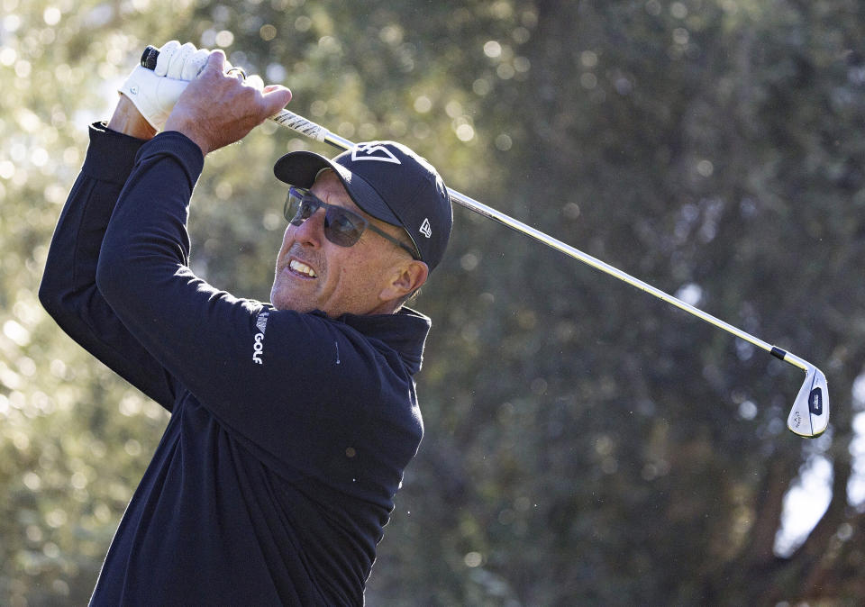 Captain Phil Mickelson, of HyFlyers GC, hits from the 12th tee during the final round of LIV Golf Las Vegas at Las Vegas Country Club, Saturday, Feb. 10, 2024, in Las Vegas. (Doug DeFelice/LIV Golf via AP)