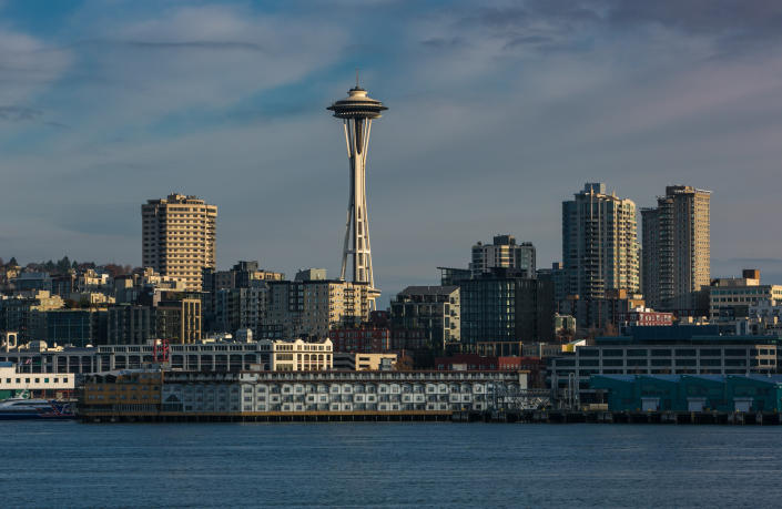 The waterfront, the Space Needle and the downtown skyline of Seattle.