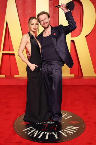 <p>Amy Sussman/Getty</p> Claudia Sulewski and Finneas O'Connell at the 'Vanity Fair' Oscars party in Beverly Hills on March 10, 2024