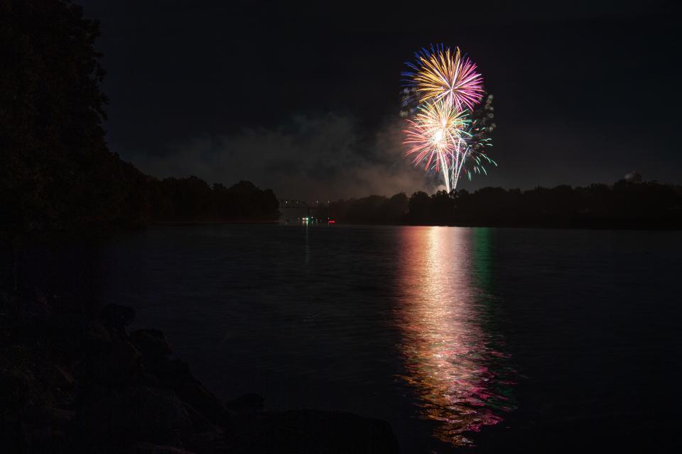 July 04, 2022; Tuscaloosa, AL, USA; Fireworks exploding over the Black Warrior River are seen from the area of the Oliver Dam in Northport as the community celebrated the July 4th holiday.  Gary Cosby Jr.-The Tuscaloosa News