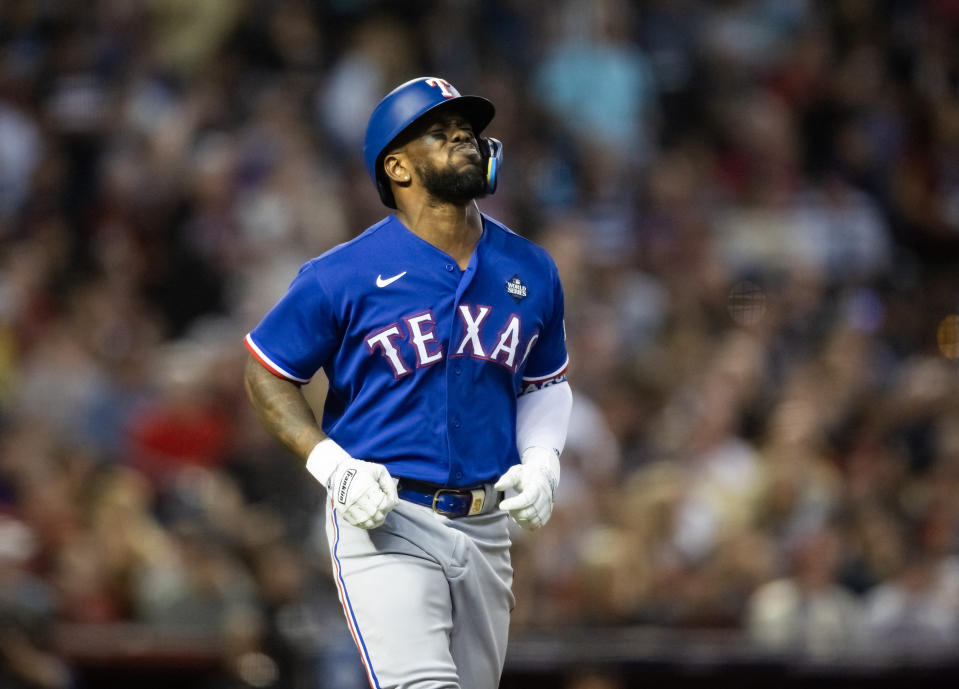 Adolis García (53) is sidelined for Game 4 of the World Series and potentially longer. (Mark J. Rebilas/Reuters)