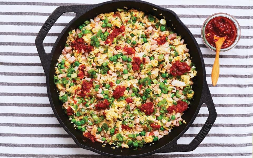 <p>Andrea Lynn</p><p>Give your family a new kind of wake-up call with a dish inspired by one of their favorite dinners.</p><p><strong>Get the recipe: <a href="https://parade.com/842720/communitytable/eggs-ham-fried-rice/" rel="nofollow noopener" target="_blank" data-ylk="slk:Eggs and Ham Fried Rice;elm:context_link;itc:0;sec:content-canvas" class="link ">Eggs and Ham Fried Rice</a></strong></p>