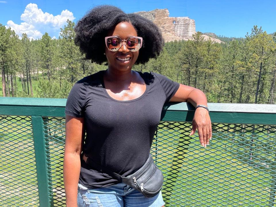 Ashley Nealy infront of crazy horse memorial in south dakota