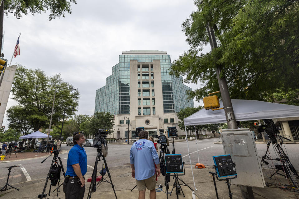 Media sets up outside the Hugo L. Black United States Courthouse before Joran van der Sloot, the chief suspect in the 2005 disappearance of Natalee Holloway arrives in court, Friday, June 9, 2023, in Birmingham, Ala. Van der Sloot will be arraigned before a federal judge in Birmingham, not far from the suburb where Holloway grew up, in his first court appearance in the case. (AP Photo/Vash Hunt)