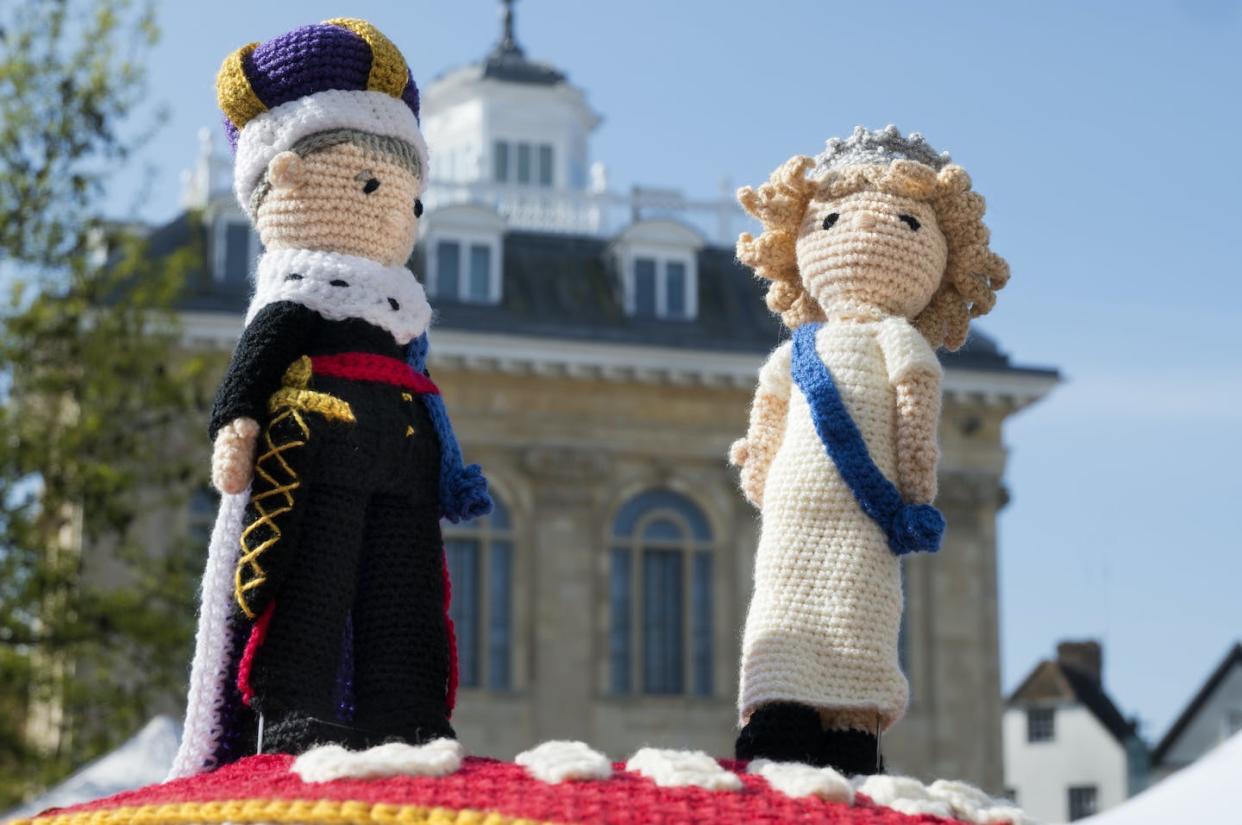 A yarn of pomp and pageantry <a href="https://www.gettyimages.com/detail/news-photo/king-charles-iii-coronation-knitted-decoration-on-a-post-news-photo/1487129510?adppopup=true" rel="nofollow noopener" target="_blank" data-ylk="slk:Planet One Images/UCG/Universal Images Group via Getty Images;elm:context_link;itc:0;sec:content-canvas" class="link ">Planet One Images/UCG/Universal Images Group via Getty Images</a>