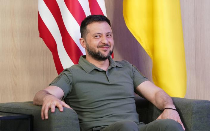 Ukraine's President Volodymyr Zelensky reacts during a bilateral meeting with US President Joe Biden