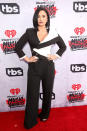 <p>Demi Lovato showed off a deconstructed black-and-white tuxedo look. <i><i>(Photo: Getty Images)</i></i></p>