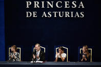 From left: Leonor, Princess of Asturias, her father Spanish King Felipe VI, her mother Spanish Queen Letizia and her sister Sofia applaud during the 2022 Princess of Asturias Awards ceremony in Oviedo, northern Spain, Friday, Oct. 28, 2022. The awards, named after the heir to the Spanish throne, are among the most important in the Spanish-speaking world. (AP Photo/Alvaro Barrientos)