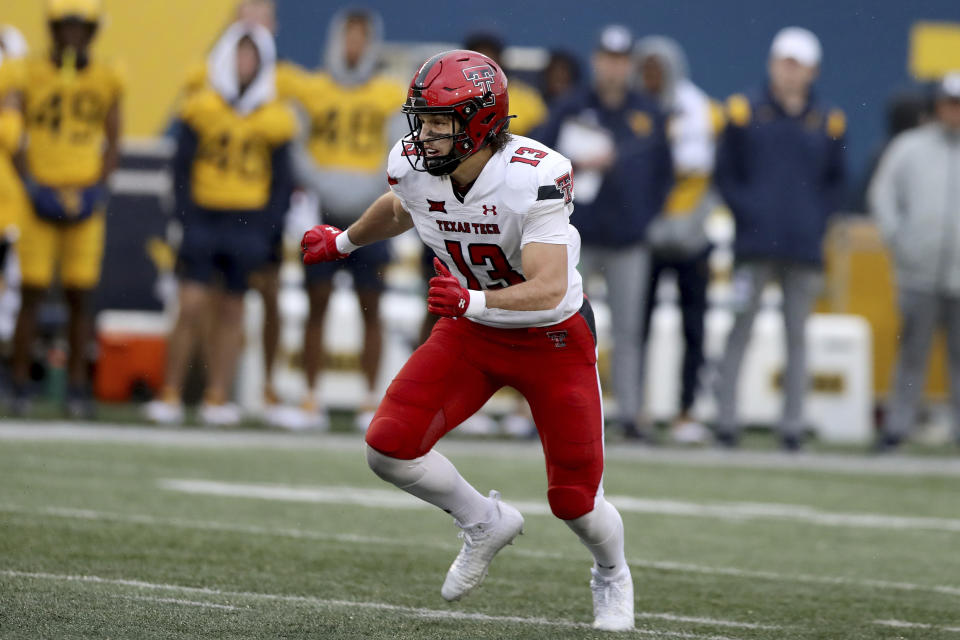 FILE - Texas Tech's Ben Roberts (13) in action against West Virginia during an NCAA football game, Sept. 23, 2023, in Morgantown, W.Va. The Texas Tech redshirt freshman linebacker is fourth in the Big 12 with 66 tackles and has two forced fumbles. (AP Photo/Gregory Payan, File)