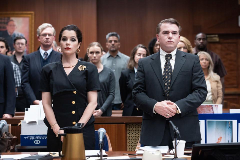 Former Wilmington actor Cullen Moss (right) with Parker Posey in HBO Max's "The Staircase." At left, in tie, is another former Wilmington actor, Jason Davis.