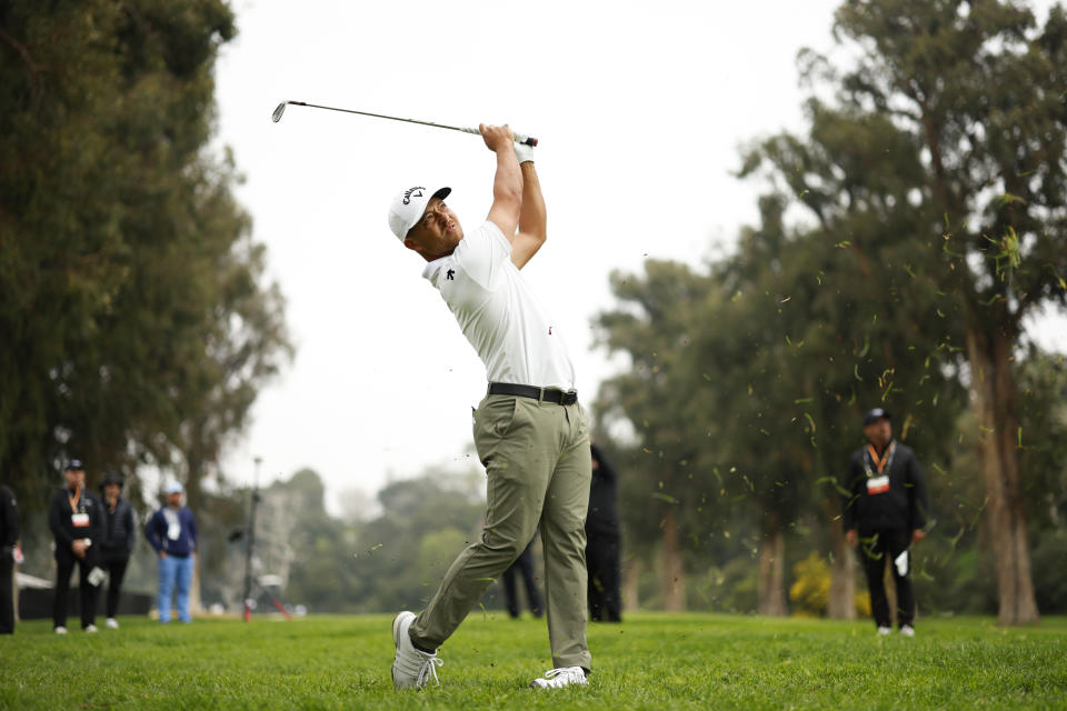 Xander Schauffele hits off the fairway rough on the 13th hole during the third round of the Genesis Invitational golf tournament at Riviera Country Club, Saturday, Feb. 17, 2024, in the Pacific Palisades area of Los Angeles. (AP Photo/Ryan Kang)