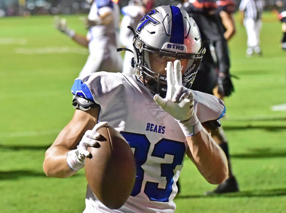 Bartram Trail's Laython Biddle reacts after running for a touchdown against Creekside.