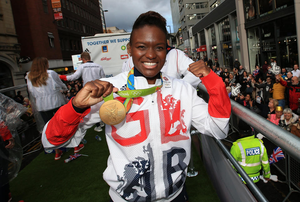 MANCHESTER, ENGLAND - OCTOBER 17:  Nicola Adams poses with her gold medal during the Olympics & Paralympics Team GB - Rio 2016 Victory Parade on October 17, 2016 in Manchester, England.  (Photo by Jan Kruger/Getty Images)