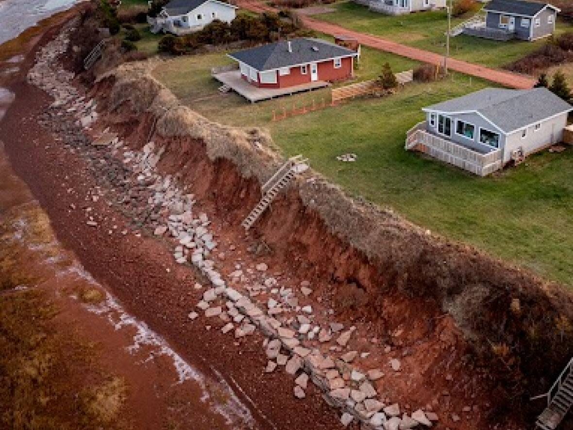 Property owners on Luke Street in Rustico have received quotes for restoration work, ranging from $35,000 to $100,000, says Arlene Betteridge, president of the Luke Street Cottage and Lot Owners Association.   (Shane Hennessey/CBC  - image credit)