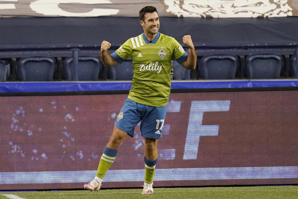 Seattle Sounders' Will Bruin reacts after scoring in stoppage time against the Portland Timbers in the second half of an MLS soccer match, Thursday, Oct. 22, 2020, in Seattle. (AP Photo/Elaine Thompson)