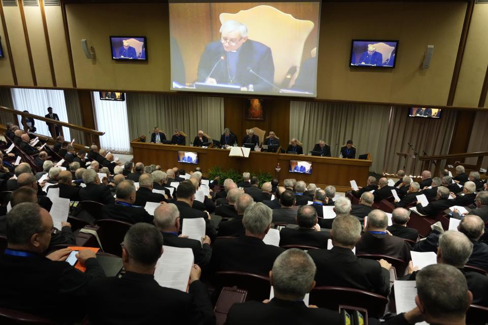 Bishops gather in the Synod hall on the occasion of Cardinal Matteo Zuppi's address during the 77th General Assembly of the Italian Bishops Conference at the Vatican, Tuesday, May 23, 2023. (AP Photo/Gregorio Borgia)