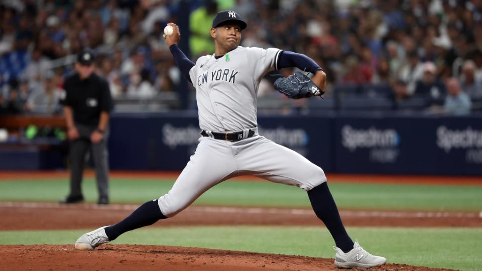 May 5, 2023; St. Petersburg, Florida, USA; New York Yankees starting pitcher Jhony Brito (76) throws a pitch during the third inning against the Tampa Bay Rays at Tropicana Field.