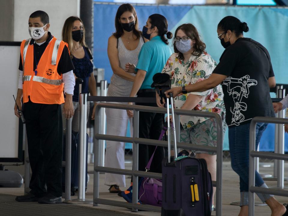 Passengers gathered at PortMiami waiting to board the Freedom of the Seas cruise ship