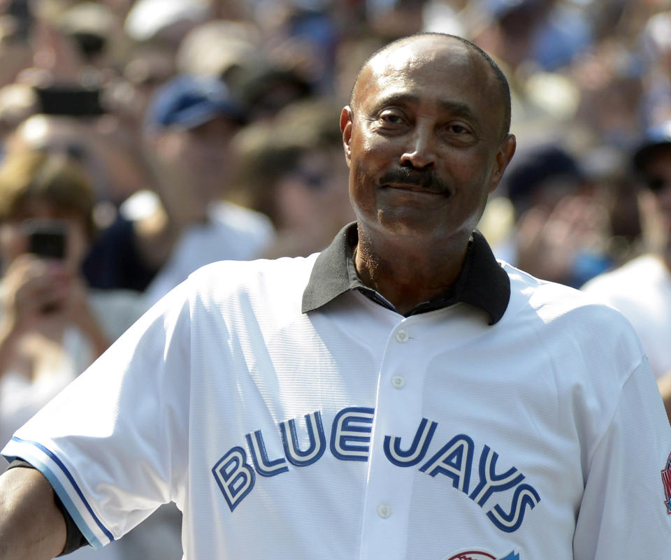 FILE - Cito Gaston, manager of the 1992 and 1993 World Series-winning Toronto Blue Jays teams acknowledges the crowd on the 25th anniversary of their back-to-back championships before a baseball game against the Tampa Bay Rays, Aug. 11, 2018, in Toronto. Sixteen members of the contemporary era Hall of Fame committee will consider an eight-man Hall ballot that includes managers Jim Leyland, Lou Piniella, Davey Johnson and Gaston. (Jon Blacker/The Canadian Press via AP, File)