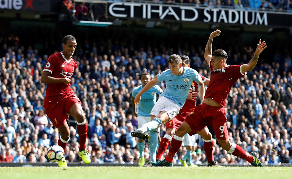 <p>Manchester City’s John Stones shoots at goal </p>