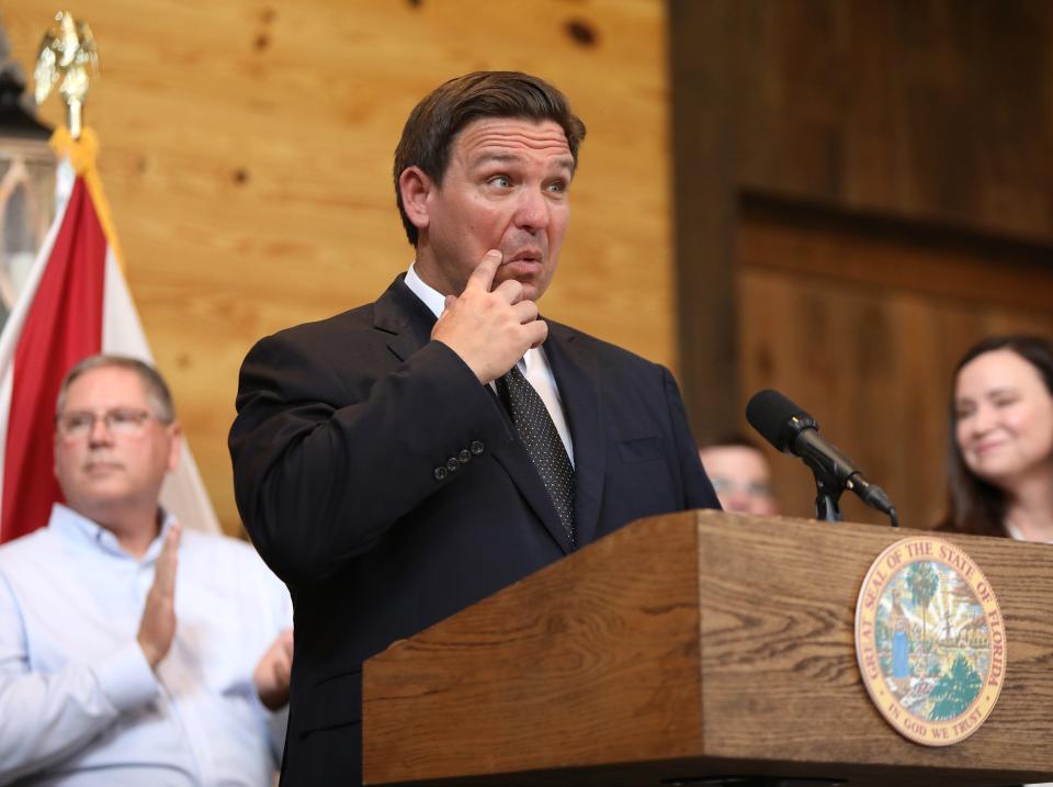 Florida Gov. Ron DeSantis delivers comments during an anti-vaccine-mandate rally held at Clark Plantation in Newberry, Fla., on Monday.