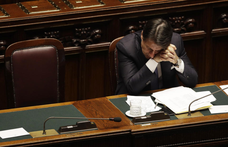 Italian Premier Giuseppe Conte sits as he attends the parliament debate ahead of confidence vote later at the Lower Chamber in Rome, Monday, Sept. 9, 2019. Conte is pitching for support in Parliament for his new left-leaning coalition ahead of crucial confidence votes. (AP Photo/Gregorio Borgia)