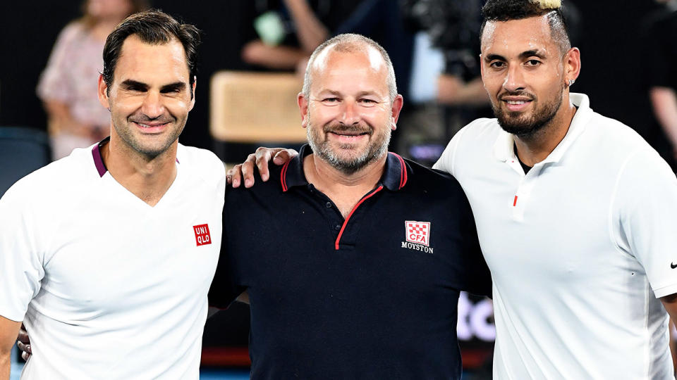 Roger Federer and Nick Kyrgios, pictured here with firefighter Alistair Mason at the Rally for Relief.