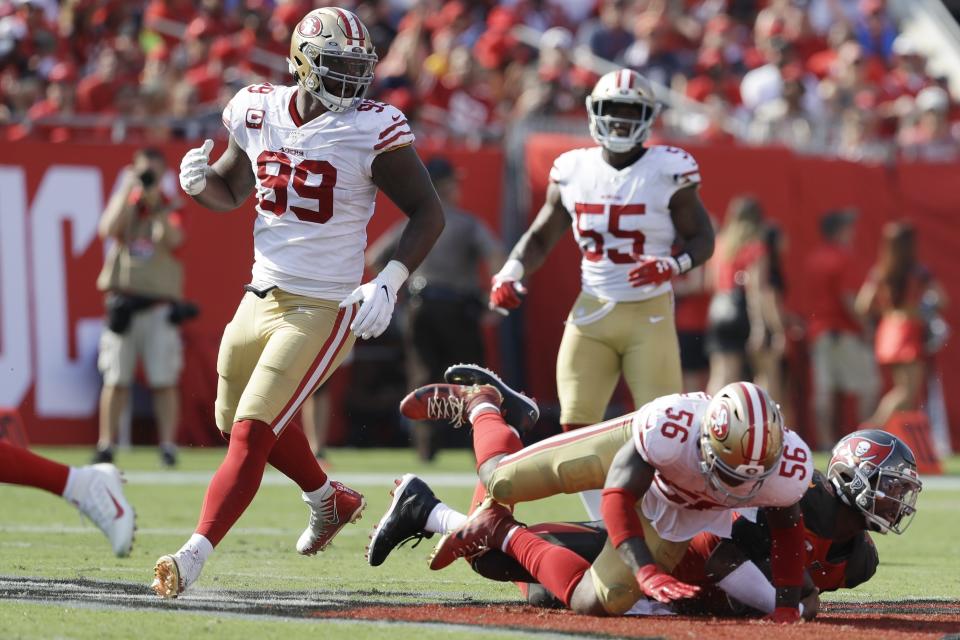 San Francisco 49ers linebacker Kwon Alexander (56) hits Tampa Bay Buccaneers quarterback Jameis Winston. Alexander was ejected for the head-to-head hit. (AP)