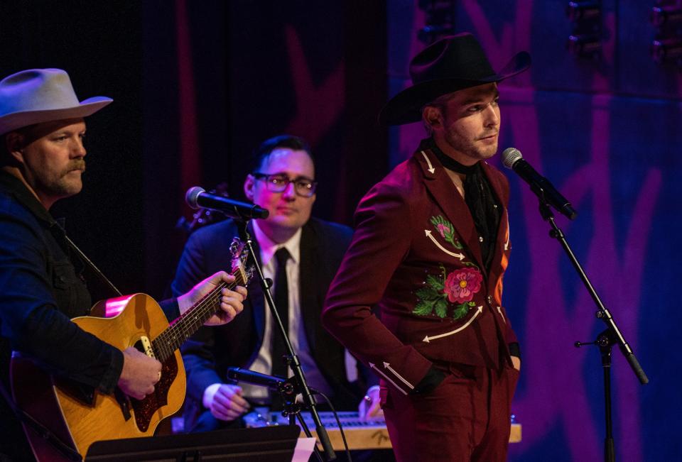 Sam Williams, right, tells a story about his granddad, Hank Williams, during Hank WIlliams' 100th birthday celebration at Country Music Hall of Fame Thursday afternoon, Sept. 21, 2023.