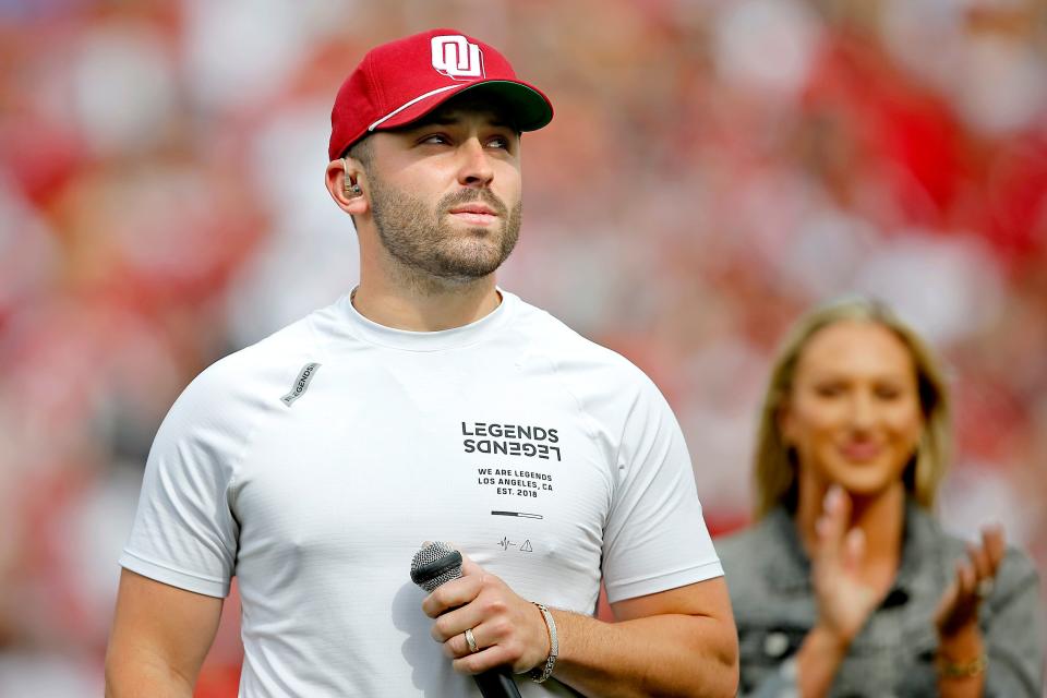 Former OU quarterback Baker Mayfield speaks to the crowd at Owen Field on April 23 in Norman.