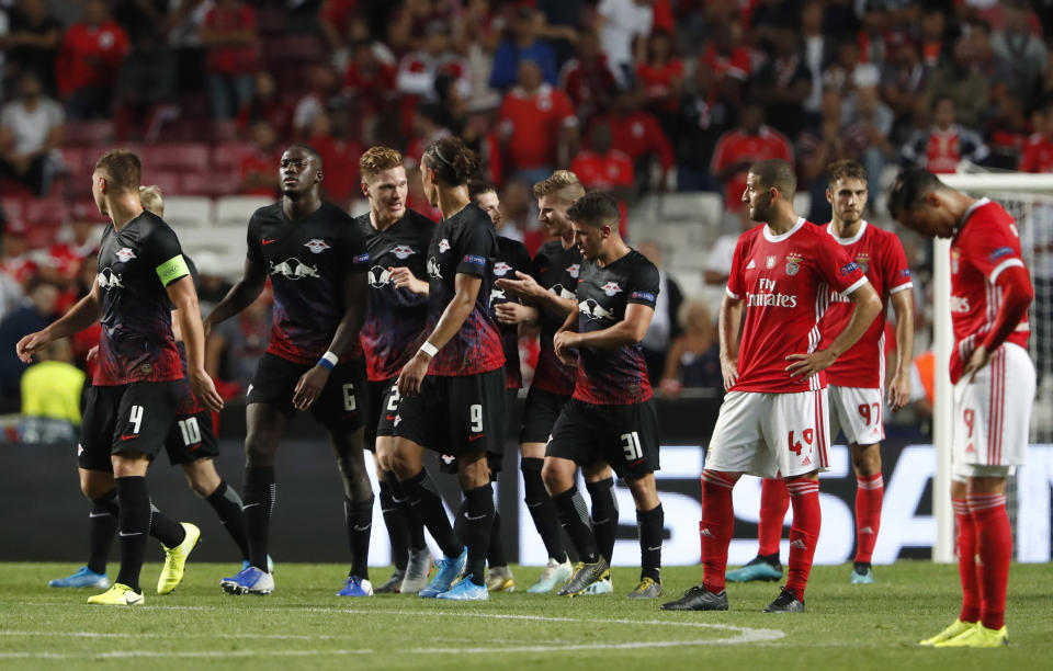 Leipzig's Timo Werner celebrates with teammates scoring the second goal during the Champions League group G soccer match between Benfica and Leipzig at the Luz stadium in Lisbon, Tuesday, Sept. 17, 2019. (AP Photo/Armando Franca)