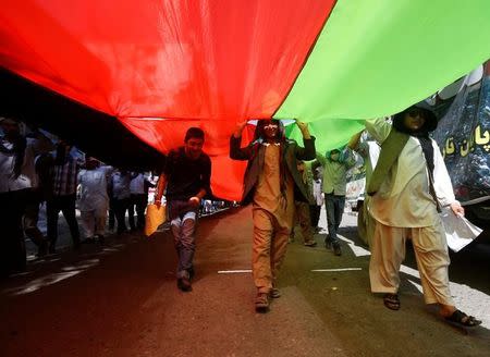 Demonstrators from Afghanistan's Hazara minority attend a protest in Kabul, Afghanistan July 23, 2016. REUTERS/Omar Sobhani