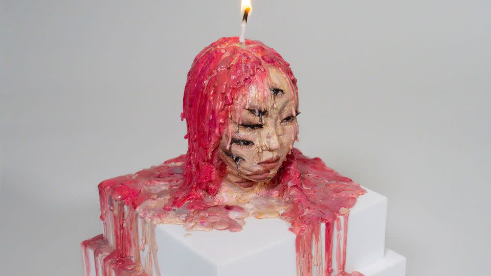 For her 2023 piece "Sleepless Night," Yoon lit a candle in a waxwork based on her own image to mark her 30th birthday. - Dain Yoon