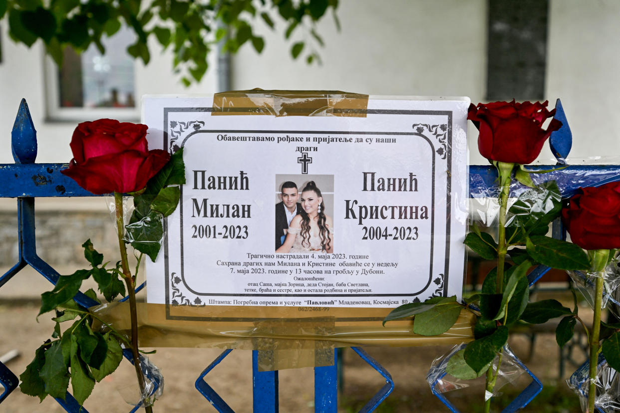 A memorial for a brother and a sister on May 6, 2023, who were killed at a school yard in a shooting in Dubona, Serbia. (Andrej Isakovic / AFP via Getty Images file)