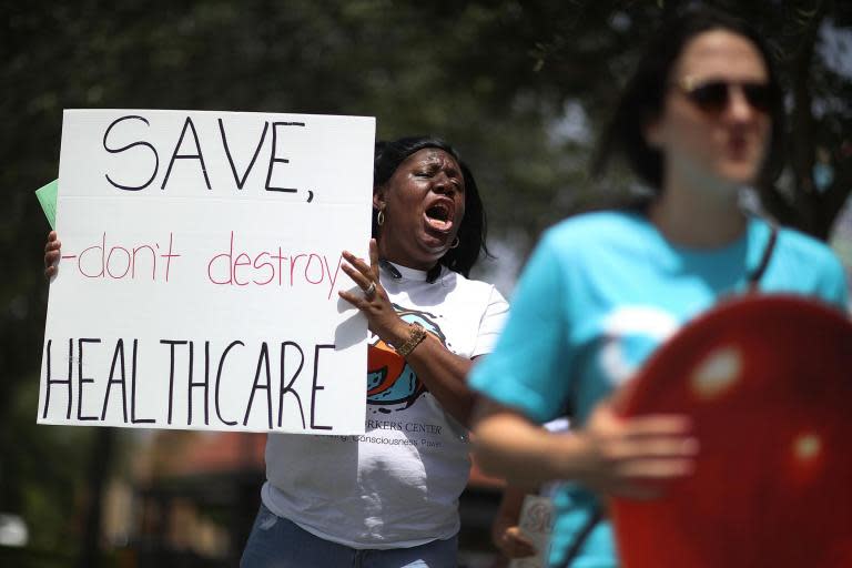 The fate of former President Barack Obama’s health care initiative, the Affordable Care Act, is once again in jeopardy.The Fifth Circuit Court of Appeals will hear arguments beginning on Tuesday over the latest legal challenge against the landmark legislation, which expands insurance access to millions while mandating every American gets health insurance or pays a tax. A three-panel judge will determine whether the law, also known as Obamacare, was rendered unconstitutional in 2017 when it zeroed out the tax imposed on those who chose not to buy insurance. US District Judge Reed O’Connor, in a ruling in Fort Worth, Texas, declared in December that it did, causing the law’s supporters to appeal.The lawsuit is fully supported by Donald Trump, who on Tuesday tweeted Obamacare would "have been replaced by something far better" if the US Supreme Court had previously deemed it unconstitutional. The result of this challenge could affect protections for people with pre-existing conditions; Medicaid expansions covering roughly 12 million people; and subsidies that help about 10 million others afford health insurance. The case could eventually reach the Supreme Court, where conservative justices have previously rejected the argument that Congress could require everyone to buy insurance under the Constitution’s interstate commerce clause. Opponents to Obamacare have noted the 2012 ruling of a divided Supreme Court that upheld the law.But Chief Justice John Roberts, joining four liberal justices, said Congress did have the power to impose a tax on those without insurance.With no tax penalty now in effect, the Texas lawsuit argues, the individual mandate is unconstitutional and the entire law must fall without it. In addition to the 18 states, two individual taxpayers are part of the lawsuit. The Trump administration is not defending the law and has filed arguments in favour of Mr O’Connor’s ruling.California’s attorney general represents a coalition of mostly Democratic-led states and the District of Columbia seeking to overturn Mr O’Connor’s ruling and uphold the law, along with the US House of Representatives. The law's supporters argue that those who filed suit have no case because they aren’t harmed by a penalty that doesn’t exist; that the reduction of the tax penalty to zero could be read as a suspension of the tax, but the tax’s legal structure still exists; and that, even if the individual mandate is now unconstitutional, that does not affect the rest of the law.Additional reporting by AP