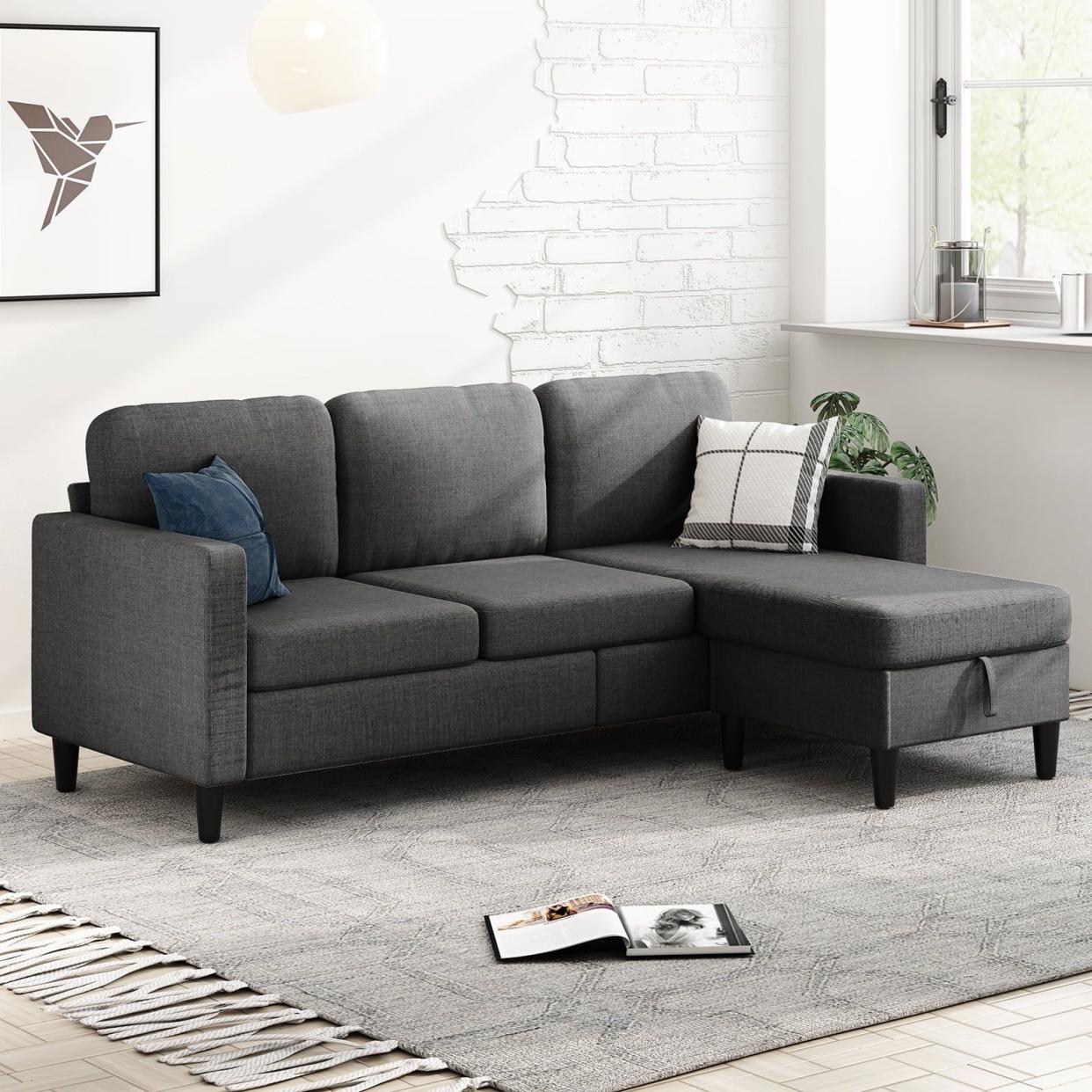 <p><a href="https://go.redirectingat.com?id=74968X1596630&url=https%3A%2F%2Fwww.walmart.com%2Fip%2FMUZZ-Sectional-Sofa-Movable-Ottoman-Free-Combination-Couch-Small-L-Shaped-Storage-Ottoman-Linen-Fabric-Set-Living-Room-Dark-Grey%2F1064017183&sref=https%3A%2F%2Fwww.housebeautiful.com%2Fshopping%2Fbest-stores%2Fa61501488%2Fwalmart-4th-of-july-sales%2F" rel="nofollow noopener" target="_blank" data-ylk="slk:Shop Now;elm:context_link;itc:0;sec:content-canvas" class="link rapid-noclick-resp">Shop Now</a></p><p>Sectional Storage Sofa </p><p>walmart.com</p><p>$192.99</p>
