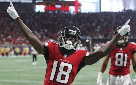 Atlanta Falcons wide receiver Calvin Ridley reacts after catching his second touchdown pass from Matt Ryan during the second quarter of an NFL football game against the New Orleans Saints, in Atlanta. Ridley's first time touching the ball against the Saints last Sunday was as a tailback. He then made his mark at his real position of wide receiver, setting a team rookie record with three TD catches in his breakout game that could impact other teams' defensive plans, including Cincinnati this week - Credit: AP