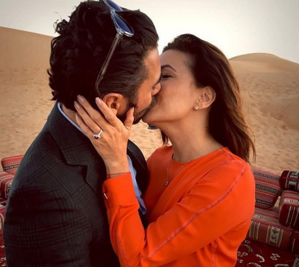 Eva Longoria and Jose Antonio Baston share a kiss after getting engaged.