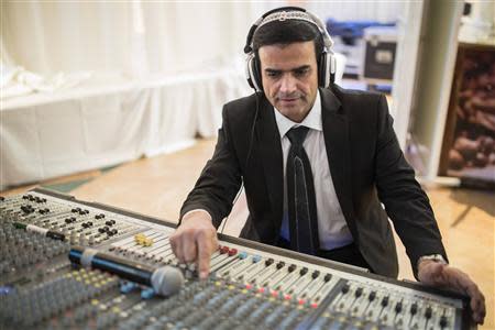 Israeli singer Zion Golan prepares before performing at a wedding celebration in the southern town of Netivot February 10, 2014. REUTERS/Amir Cohen