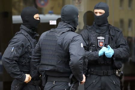 German special police forces outside a muslim prayer room in Hildesheim, Germany, March 14, 2017. REUTERS/Kai Pfaffenbach