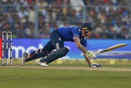 Cricket - India v England - Third One Day International - Eden Gardens, Kolkata, India - 22/01/2017. England's Ben Stokes loses his balance after playing a shot. REUTERS/Rupak De Chowdhuri