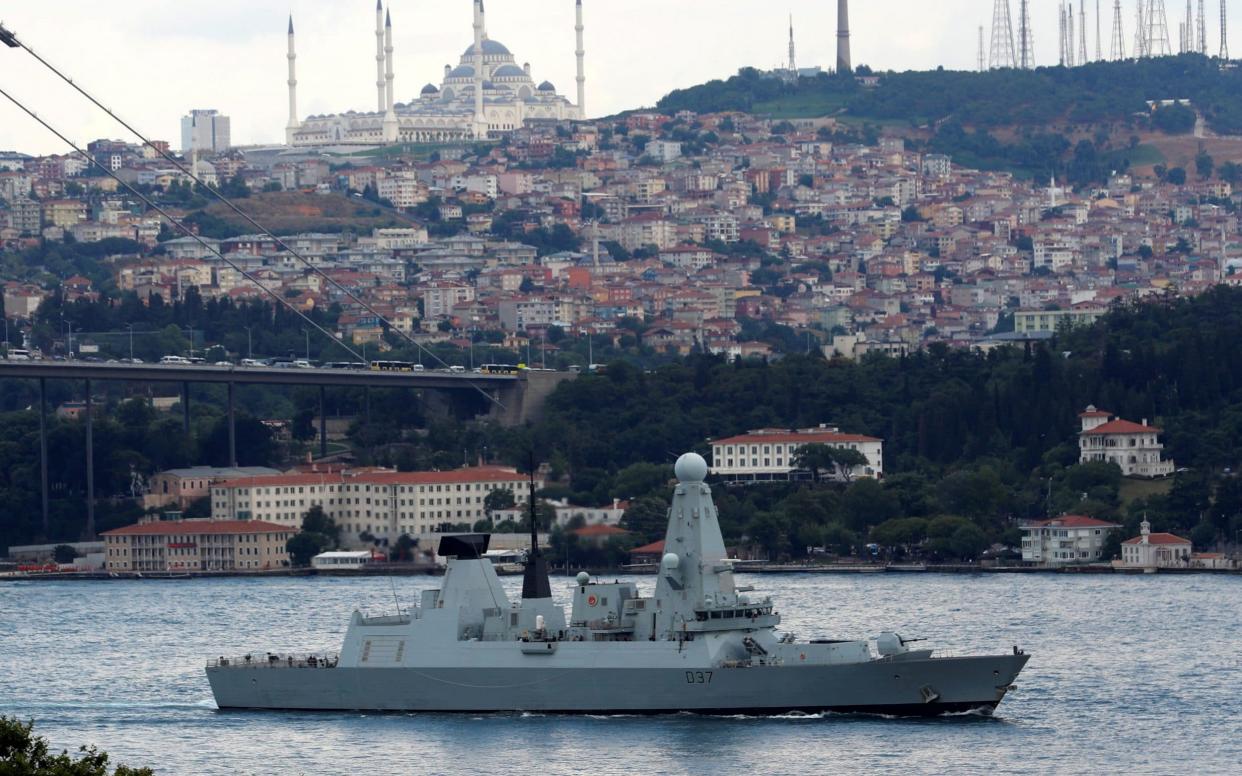 British Royal Navy destroyer HMS Duncan (D37) sails in the Bosphorus, on its way to the Mediterranean Sea, in Istanbul - REUTERS